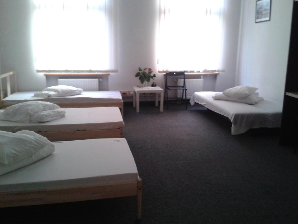 Hostel Kamienica Rynek 7 Катовице Стая снимка