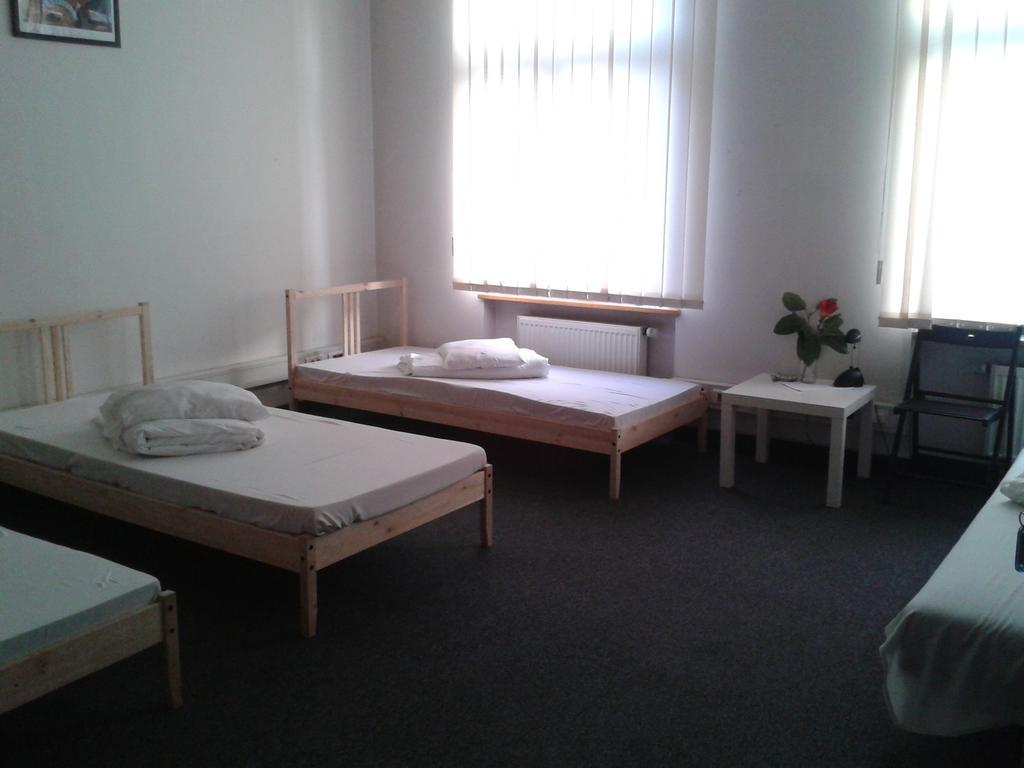 Hostel Kamienica Rynek 7 Катовице Стая снимка